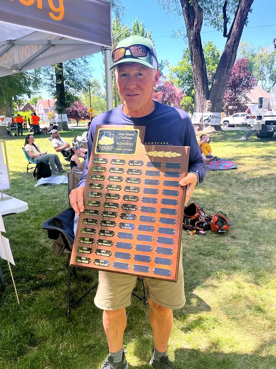 Brian Getzelman with the Utah Community Forest Council award plaque